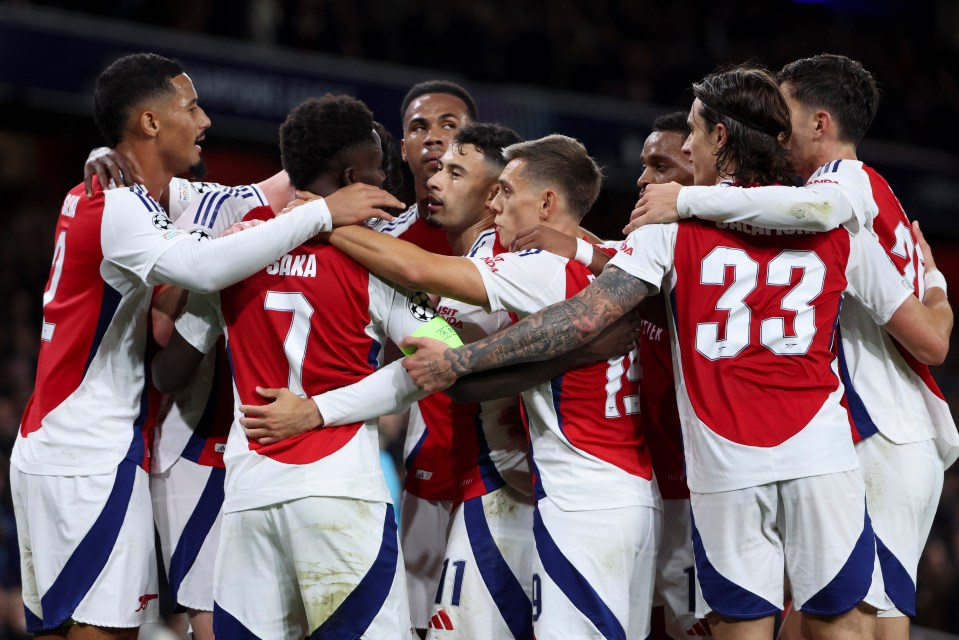 Arsenal players celebrating a goal.