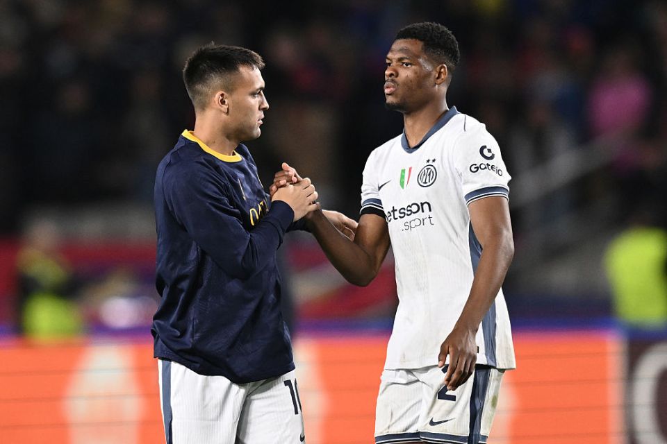 BARCELONA, SPAIN - APRIL 30: Denzel Dumfries of Internazionale and Lautaro Martinez of Internazionale reacts during the UEFA Champions League 2024/25 Semi Final First Leg match between FC Barcelona and FC Internazionale Milano at Estadi Olimpic Lluis Companys on April 30, 2025 in Barcelona, Spain. (Photo by Image Photo Agency/Getty Images)