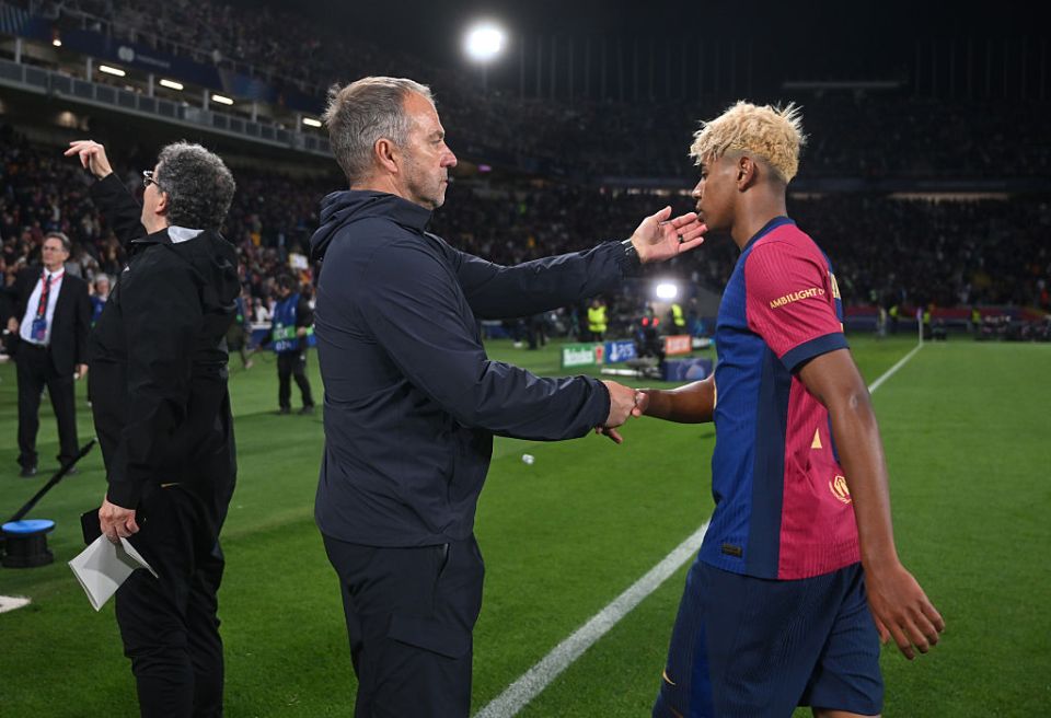 BARCELONA, SPAIN - APRIL 30: Lamine Yamal of FC Barcelona shakes the hand of Hansi Flick, Head Coach of FC Barcelona, as he leaves the pitch after the UEFA Champions League 2024/25 Semi Final First Leg match between FC Barcelona and FC Internazionale Milano at Estadi Olimpic Lluis Companys on April 30, 2025 in Barcelona, Spain. (Photo by Michael Regan - UEFA/UEFA via Getty Images)