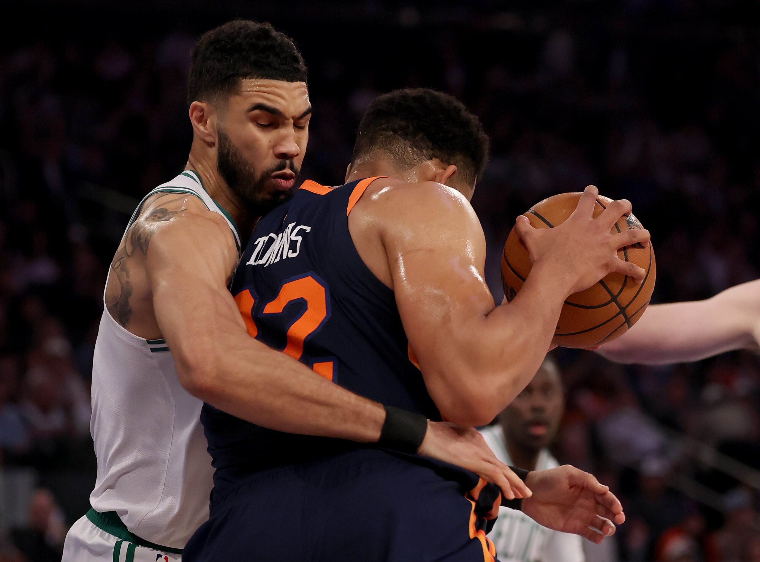 NEW YORK, NEW YORK - MAY 12:  Karl-Anthony Towns #32 of the New York Knicks heads for the net as Jayson Tatum #0 of the Boston Celtics defends in the first half in Game Four of the Eastern Conference Second Round NBA Playoffs at Madison Square Garden on May 12, 2025 in New York City. NOTE TO USER: User expressly acknowledges and agrees that, by downloading and or using this photograph, User is consenting to the terms and conditions of the Getty Images License Agreement. (Photo by Elsa/Getty Images). (Photo by Elsa/Getty Images)