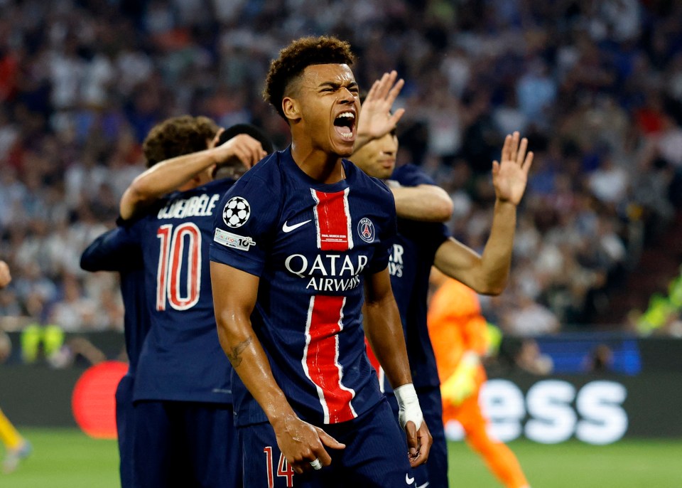 Paris St Germain's Desire Doue celebrates a goal.