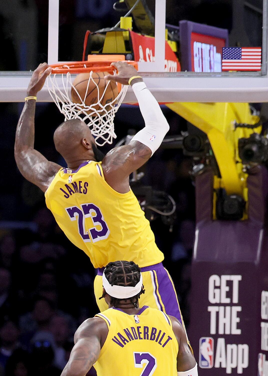 Lakers forward LeBron James dunks during the second quarter of a loss to the Timberwolves