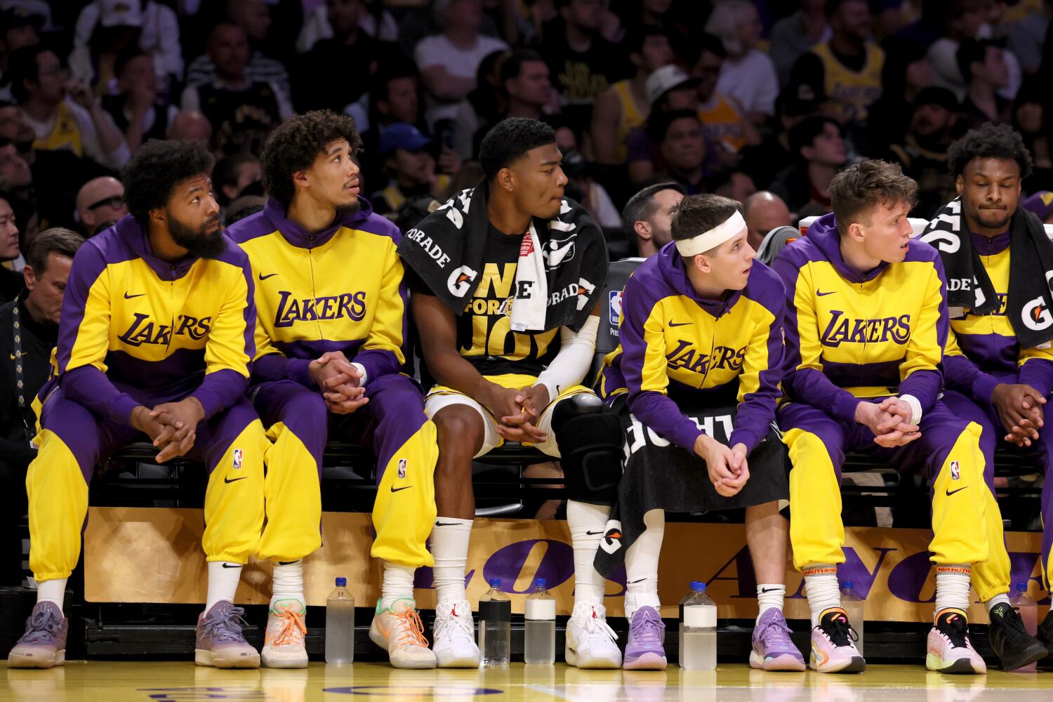 The Lakers bench watches the action during the second quarter of the team's Game 5 playoff loss to the Timberwolves