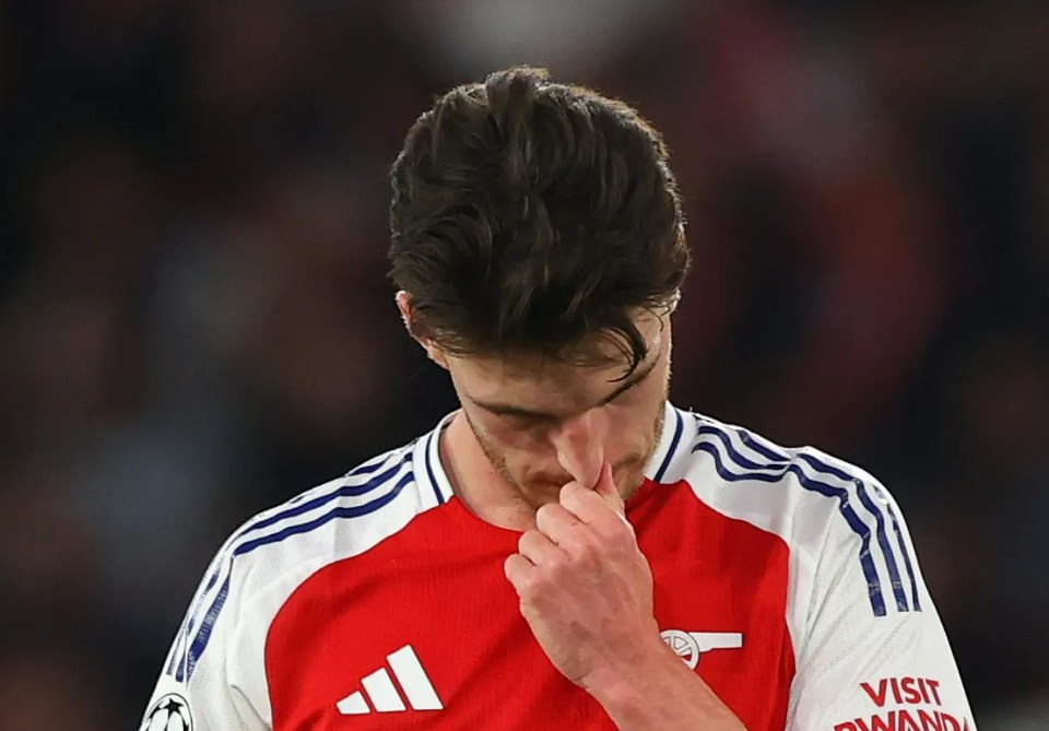 Declan Rice of Arsenal looking dejected during a soccer match.