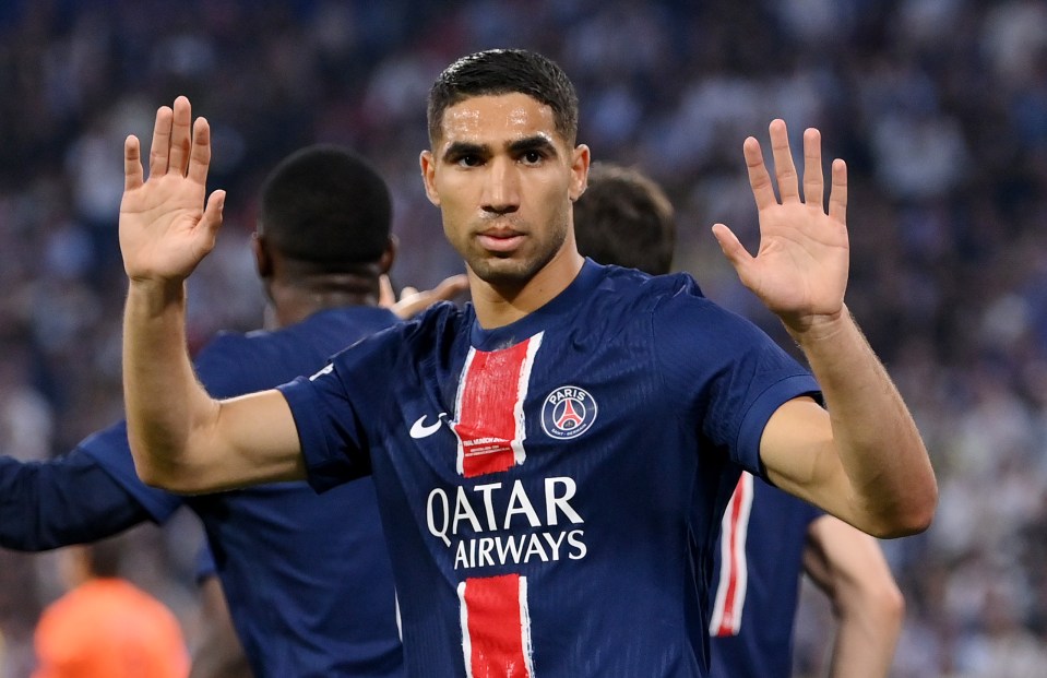 Achraf Hakimi of Paris Saint-Germain celebrating a goal.