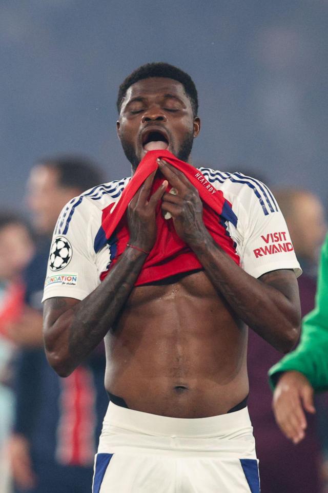 Thomas Partey of Arsenal appearing dejected after a UEFA Champions League match.