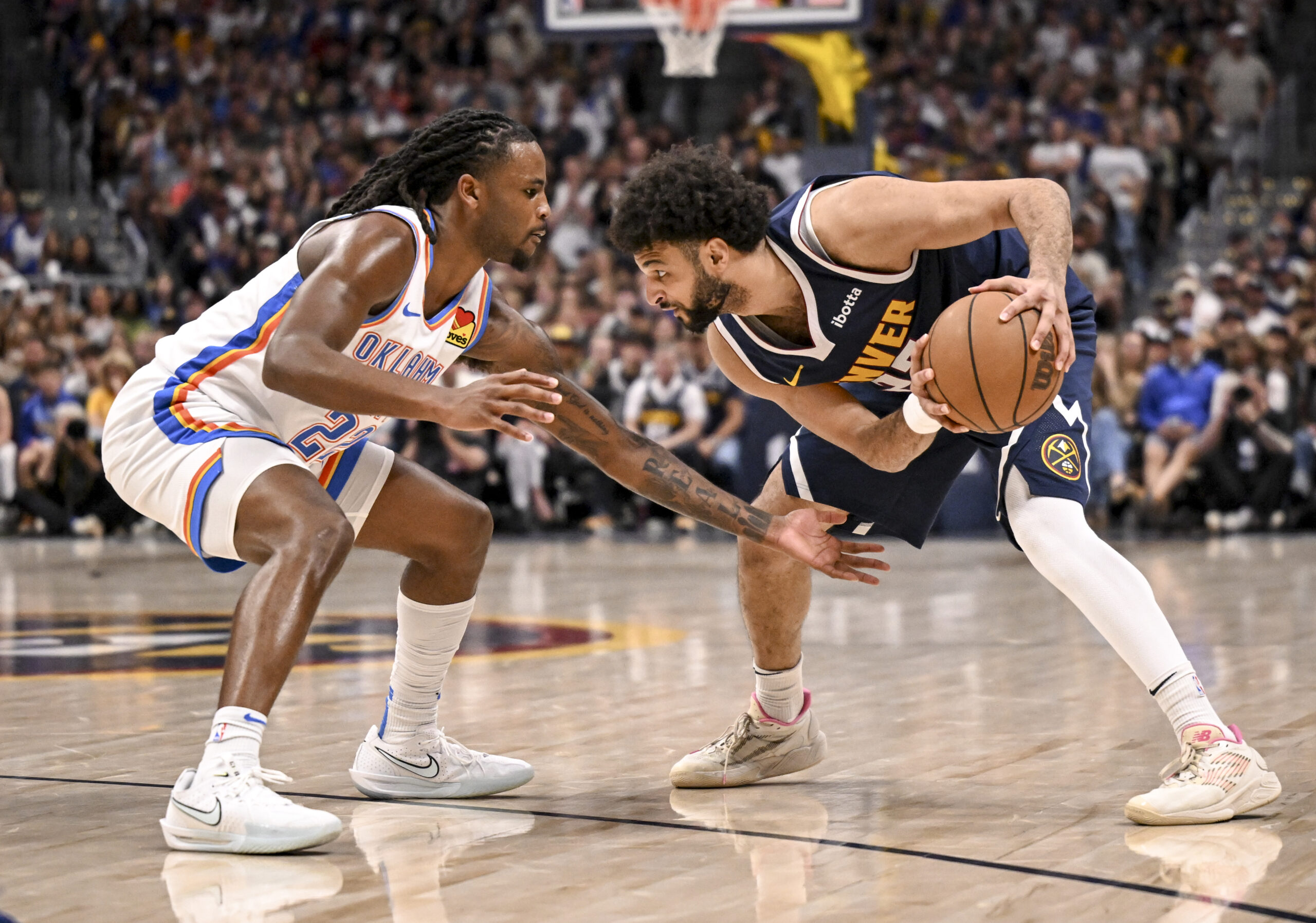Cason Wallace's defensive pressure off the bench helped spark Oklahoma City's rally in the fourth quarter. (Photo by AAron Ontiveroz/The Denver Post)