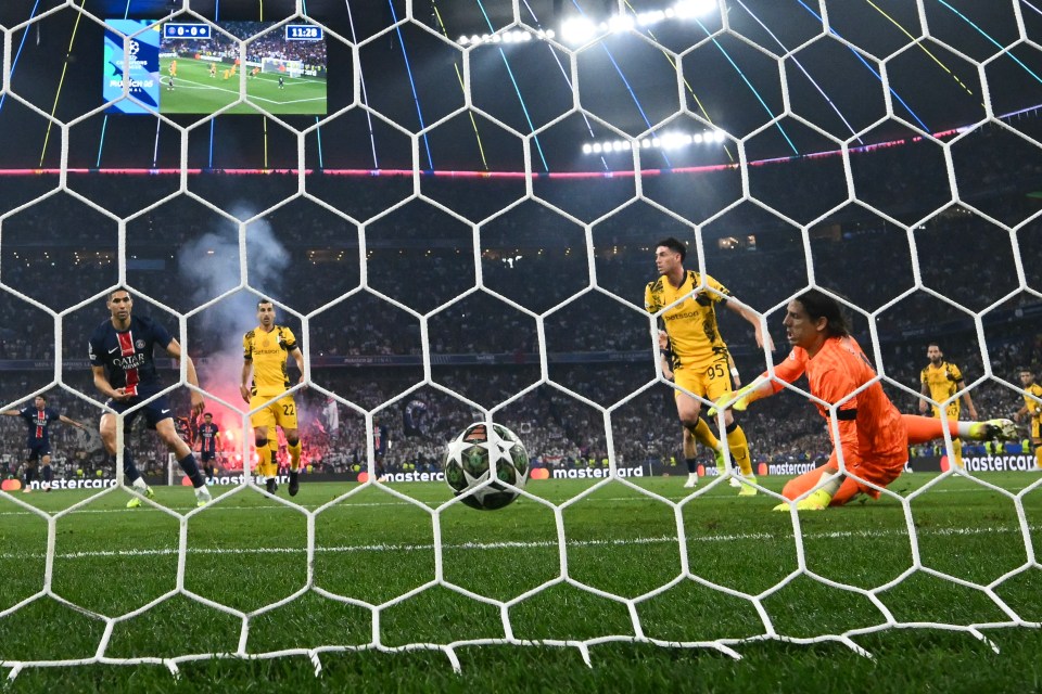 Soccer goalie failing to stop a goal.